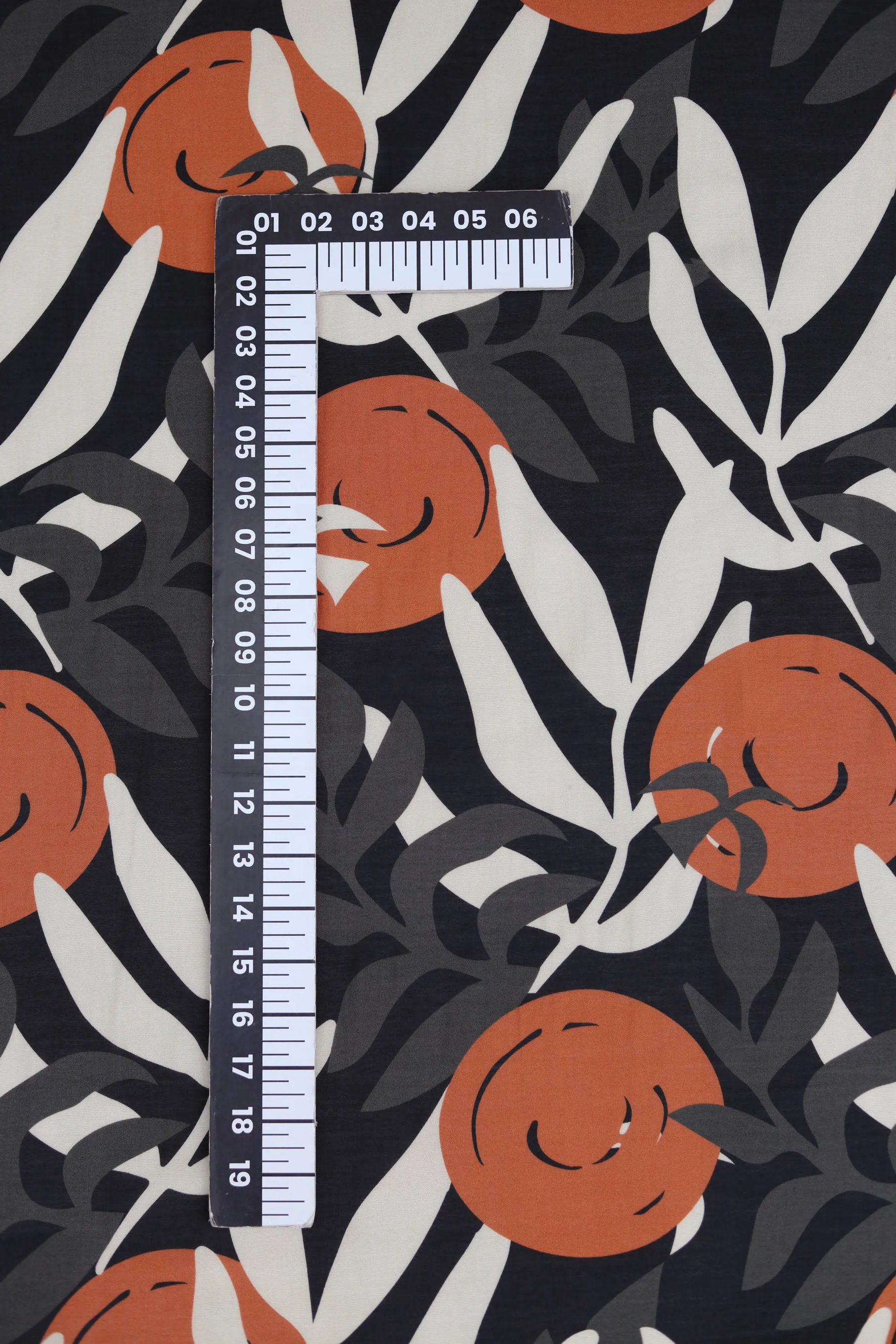 Black and Rust Leaf Pattern Printed Natural Muslin Silk Fabric